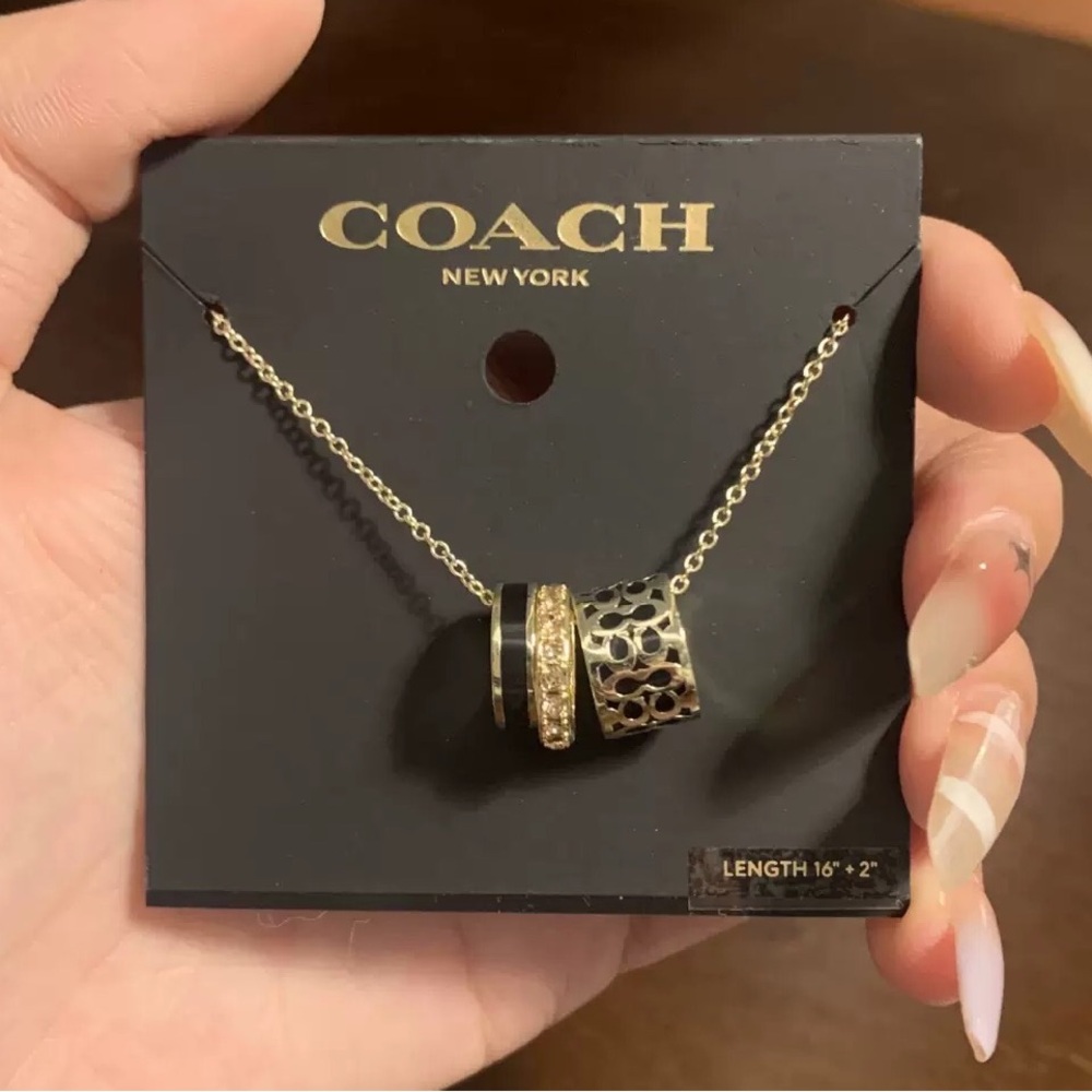 Coach Signature Gold and Black Ring Pendant Necklace